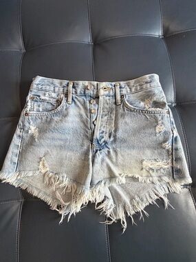 Agolde Light Blue Distressed Denim Shorts with Frayed Hem